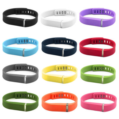 Colorful silicone straps for Fitbit Flex, available in various shades including black, white, blue, and pink. Perfect for style and comfort. Upgrade your fitness accessory today!