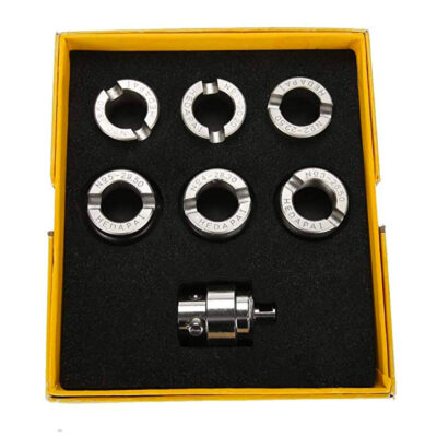 Set of six stainless steel case opening dies for Oyster watches, designed for precision and durability. Includes a central tool for easy application, all in a protective box