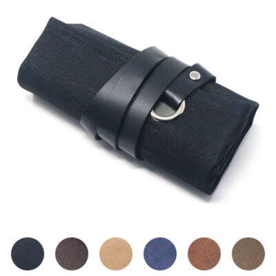 A stylish waxed canvas watch roll that securely holds up to 5 watches. Features a sleek black design with a leather strap for easy portability. Perfect for travel and storage