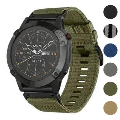 Pro Seatbelt Strap for Garmin QuickFit 26 devices, featuring a durable design in olive green, with a close-up of the watch face displaying time and various metrics