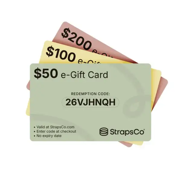 A collection of StrapsCo e-Gift Cards in various denominations: $50, $100, and $200, featuring a unique redemption code for online purchases