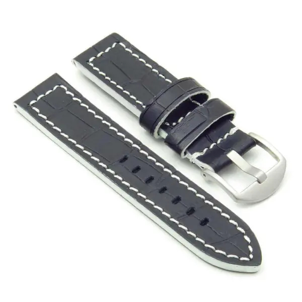 Stylish black leather watch strap with white stitching and a silver buckle. Perfect for adding a sophisticated touch to any watch. Durable and comfortable for everyday wear