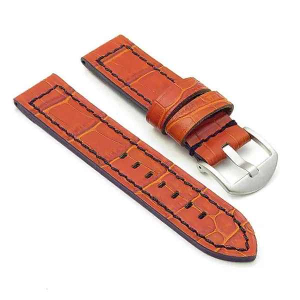 Stylish orange leather watch strap with a textured finish and silver buckle. Perfect for adding a touch of elegance to your timepiece. Durable and comfortable for everyday wear