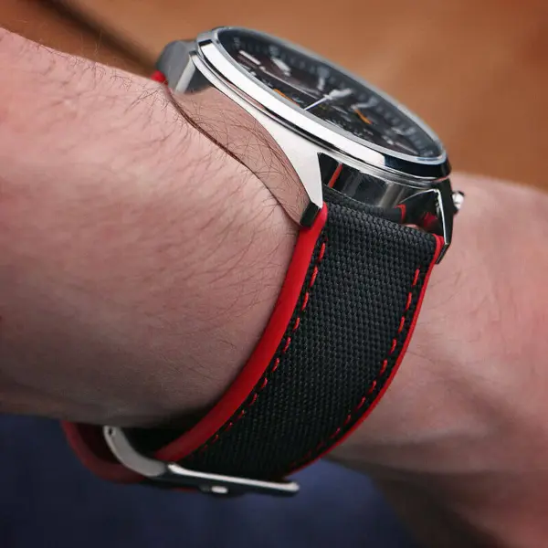 Sailcloth FKM Hybrid Strap by DASSARI features a stylish design with red stitching, made from durable FKM and rubber. Available in 20mm and 22mm sizes for a perfect fit