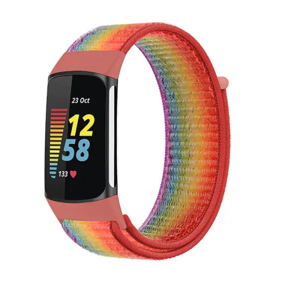 Colorful nylon strap for Fitbit Charge 5, featuring a vibrant rainbow design. Durable and comfortable, perfect for everyday wear and fitness tracking